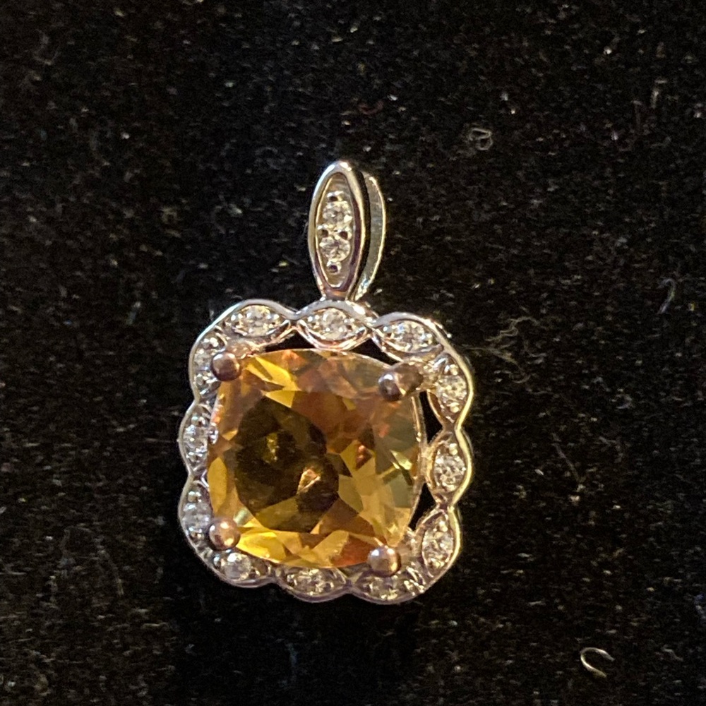 Genuine citrine pendant in sterling silver with diamond border